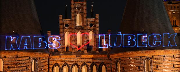 Kabs Polsterwelten Guerilla-Werbung mit Laser Beamer in Lübeck