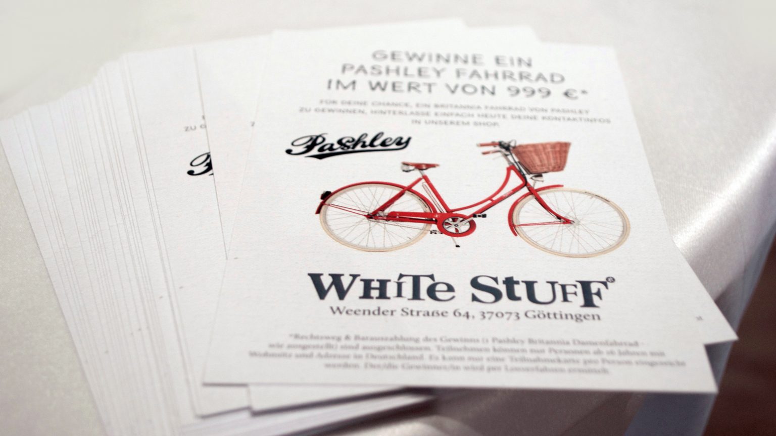 Teilnahmekarte für Gewinnspiel-Aktion zur White Stuff Shop Eröffnung